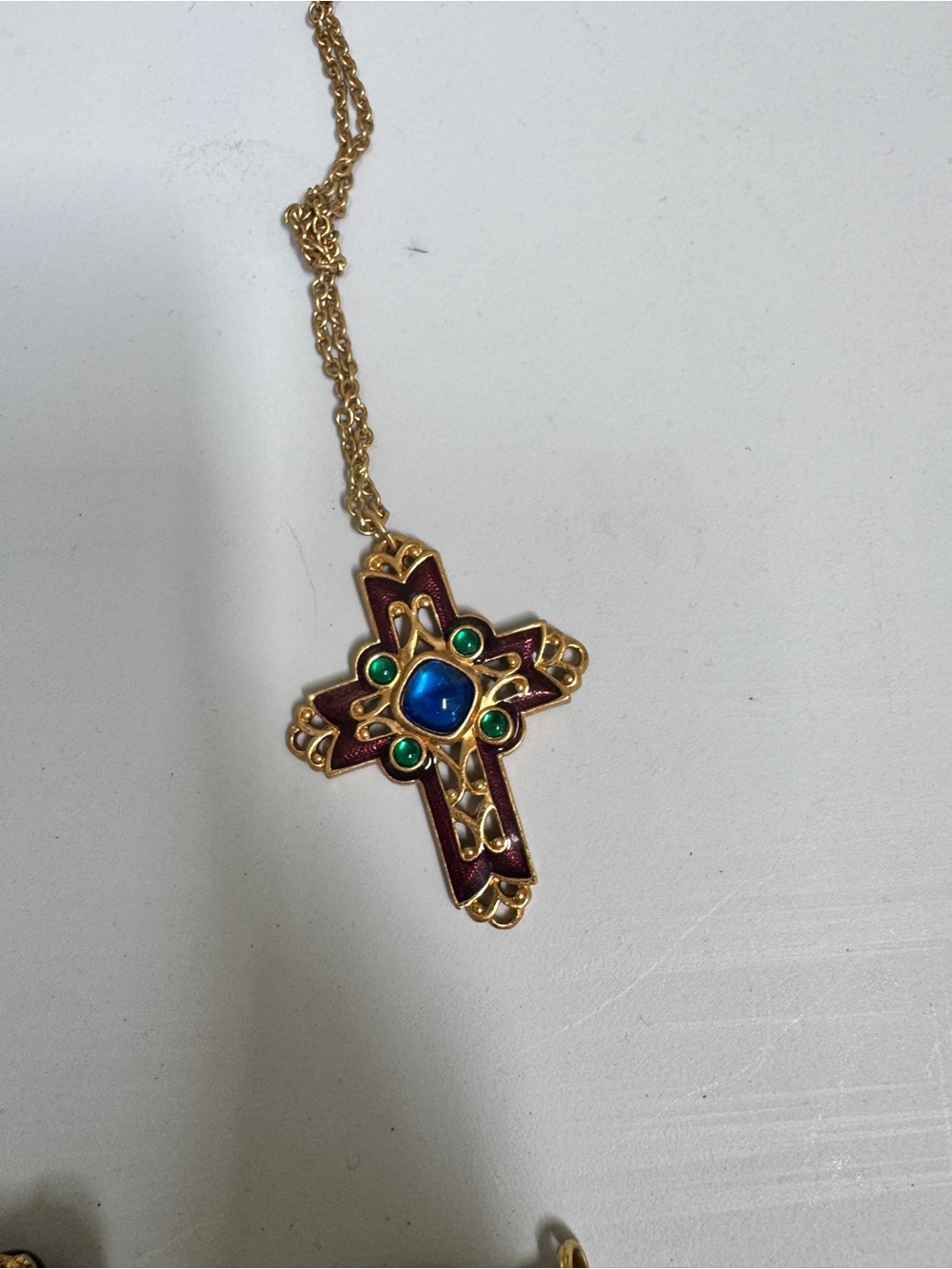 Vintage AVON Gold-Tone Cross Necklace with Blue Center and Green Accents